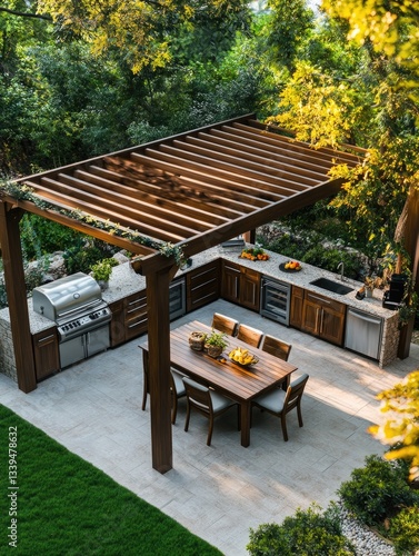 Outdoor kitchen with grill and dining table