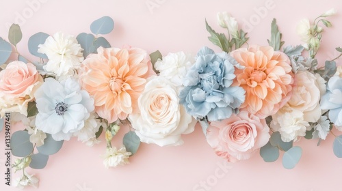 Elegant wedding flowers in muted tones of peach, ivory, and dusty blue, set against a classic soft pink background.