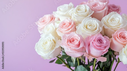 White and blush roses arranged delicately for a wedding, displayed beautifully on a soft pastel purple background.