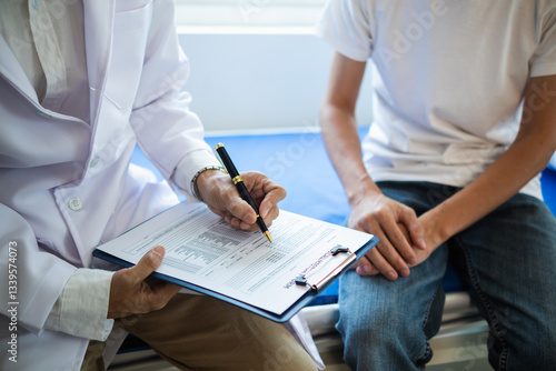 A young man suffering from erectile dysfunction seeks consultation with a specialist to identify the cause of his erectile dysfunction and seek treatment or cure for the erectile dysfunction.