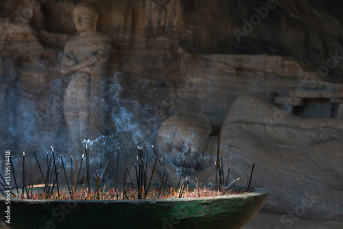 Incense Burning in Front of Ancient Sri Lankan Buddha Statue
