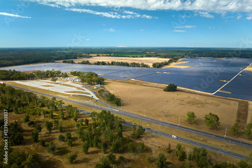 Wallpaper Mural Aerial view of big sustainable electric power plant with many rows of solar photovoltaic panels for producing clean electrical energy. Renewable electricity with zero emission concept Torontodigital.ca