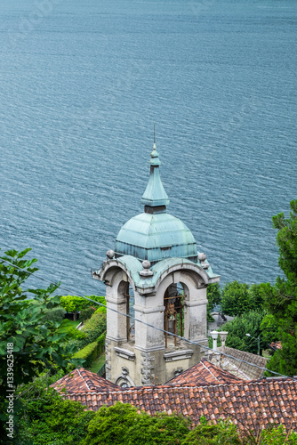 Dome of a church with Como lake in background , Italy