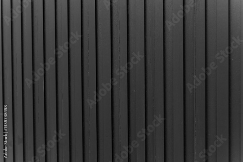 Wallpaper Mural Close-up of a black vertical panel texture with a modern geometric pattern, creating a sleek and minimalist background Torontodigital.ca