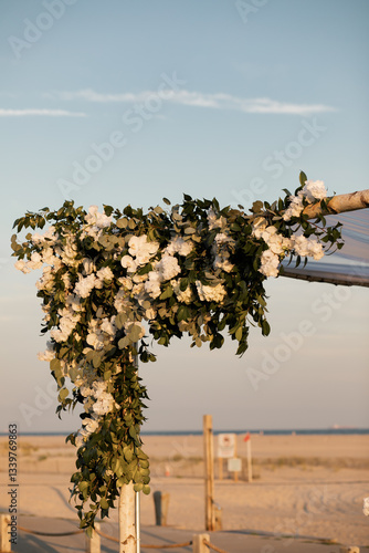 Fotografie beautiful floral arrangement on corner of chuppah set up at traditional jewish c