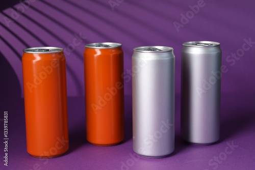 Many tin cans on purple background with shadow