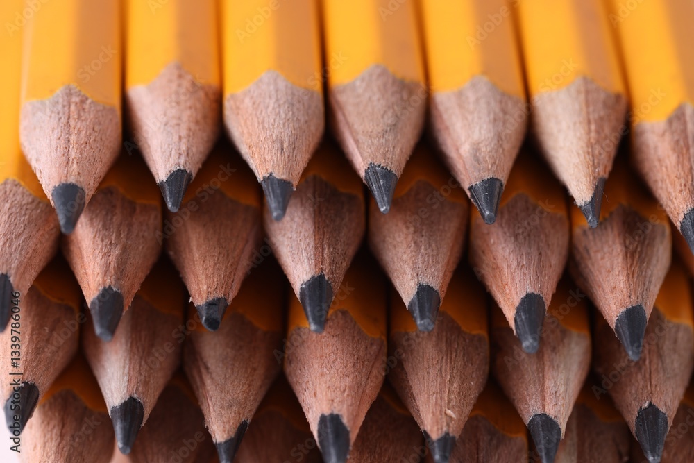 Many graphite pencils as background, closeup view Many graphite pencils as background, closeup view