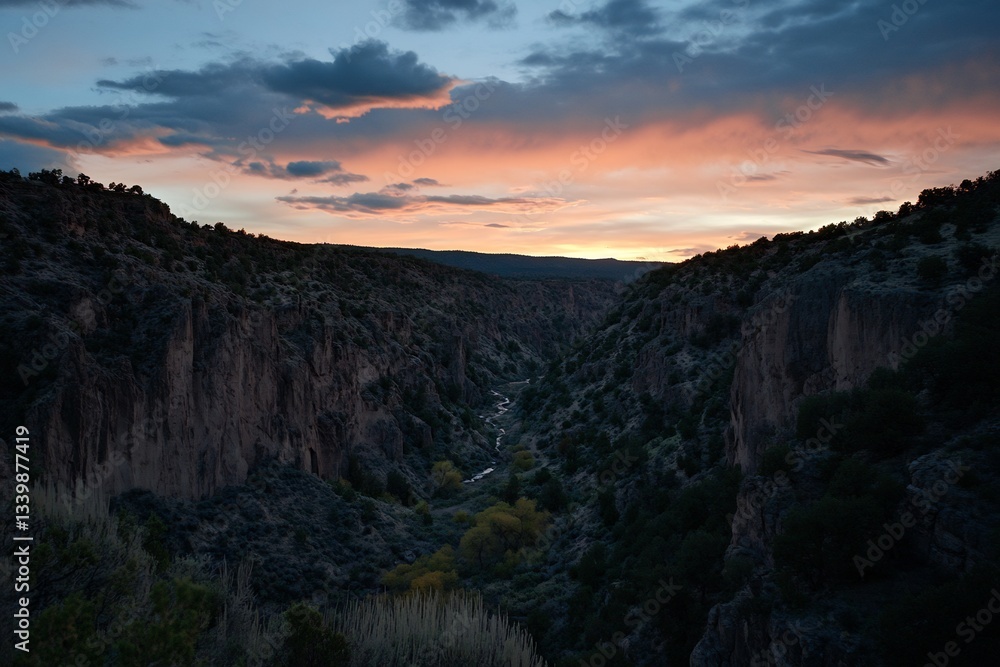 Fototapeta premium A dramatic canyon at sunset with