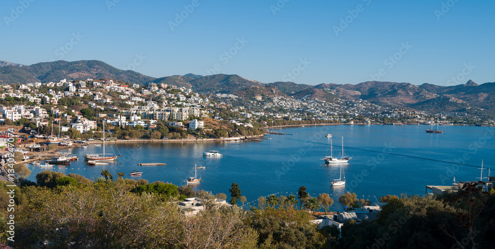 Fototapeta premium A panoramic summer view of Yalıkavak bay. Beautiful holiday resort on the Bodrum peninsula. Mugla province, Turkey country