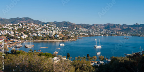 Fototapeta Naklejka Na Ścianę i Meble -  A panoramic summer view of Yalıkavak bay. Beautiful holiday resort on the Bodrum peninsula. Mugla province, Turkey country