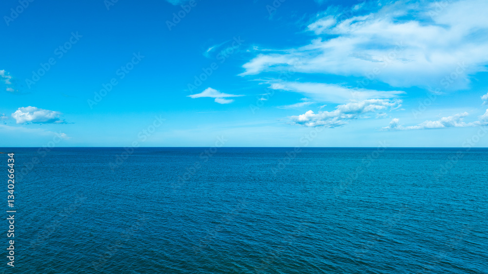 Fototapeta premium Panorama of cloud clear sky background for summer vacation concept at ocean and summer sea water with sunlight of beautiful cloudy