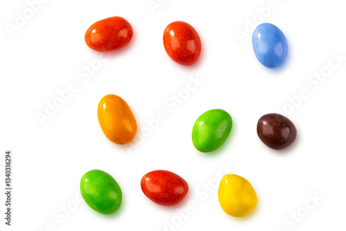 Fotografi Colorful chocolate coated candies isolated on white background