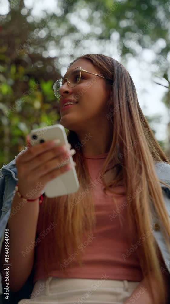 Young Woman Using Smartphone and Enjoying the Moment
Young Woman Using Smartphone and Enjoying the Moment