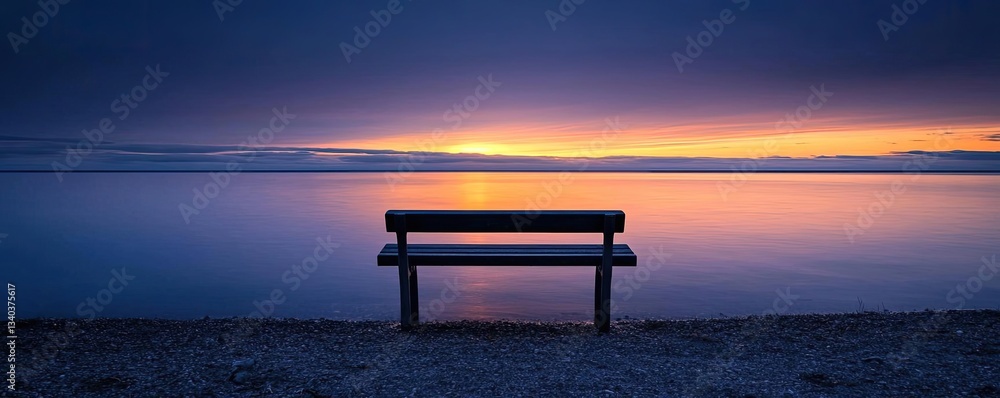 Lakeside sunset landscapes idea. A serene bench overlooking a tranquil lake at sunset, surrounded by nature's beauty. Lakeside sunset landscapes idea. A serene bench overlooking a tranquil lake at sunset, surrounded by nature's beauty.