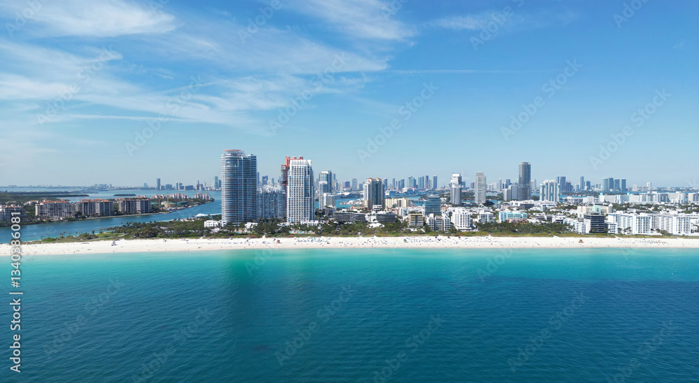 Obraz premium Miami beach cityscape. Miami summer aerial view. Miami Beach shoreline. South Beach Miami aerial view. Blue ocean in Florida skyline. Miamis cityscape. Ocean coast.