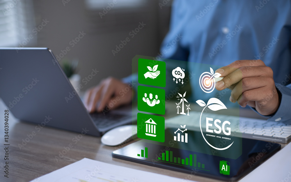 Businessman Analyzing Sustainable Investments with Green Icons and Charts, ESG Concept, Green Business, World Environment Day, ESG Carbon Emissions, Co2 to Net Zero Businessman Analyzing Sustainable Investments with Green Icons and Charts, ESG Concept, Green Business, World Environment Day, ESG Carbon Emissions, Co2 to Net Zero