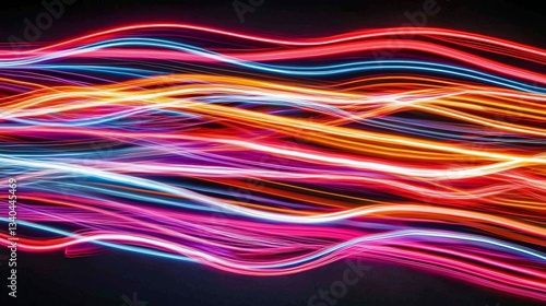 Abstract motion of streaming data lines, colorful neon energy waves symbolizing internet speed, big data, and advanced network communication