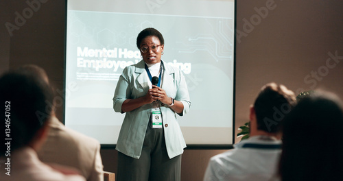 Seminar, speaker and woman with mic, talking and public speaking for mental health in workplace or stage. Business, presentation and employee with speech for audience, people and podium for presenter