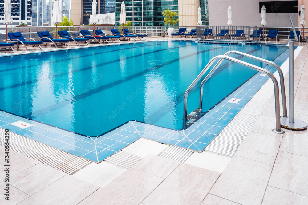 Dubai. Stunning rooftop pool at a luxury hotel in Dubai during a early morning Dubai. Stunning rooftop pool at a luxury hotel in Dubai during a early morning