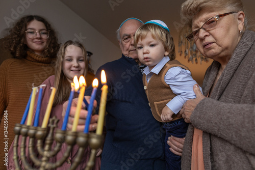 Traditional Jewish holiday of Hanukah.visiting grandparents photo