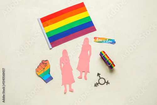 LGBT flag with paper female...