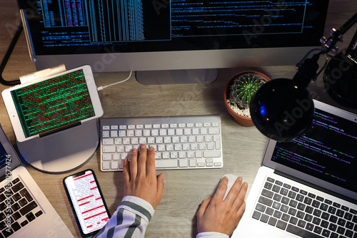 Female programmer working i...