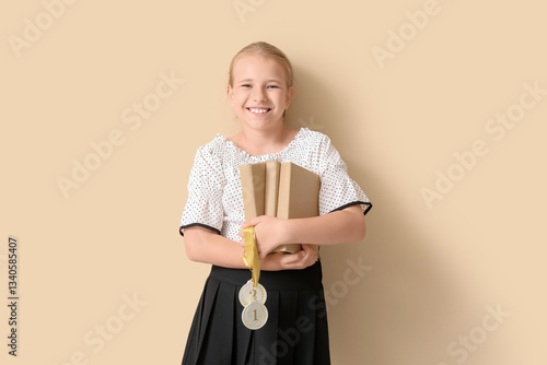 Cute little schoolgirl with...