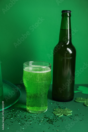 Glass and bottle of beer wi...