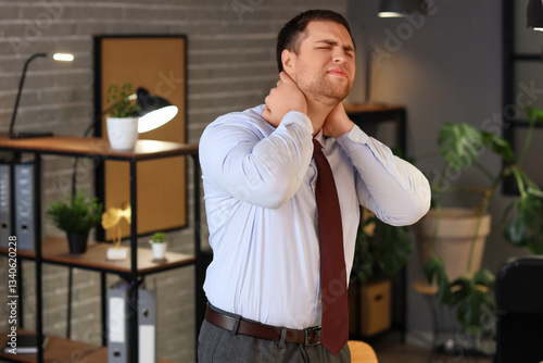 Businessman suffering from ...