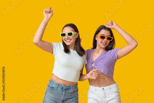 Beautiful young women in su...
