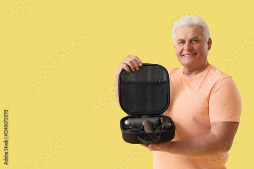 Mature man with percussive ...