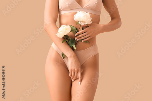 Beautiful young woman in st...