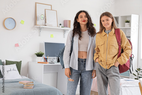 Female students with backpa...