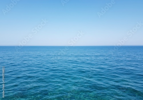 Wallpaper Mural Ocean with turquoise surface glistening in sunlight with clear horizon reflecting cloudless sky creating tranquil nautical scenery, for vacation and summer postcard Torontodigital.ca