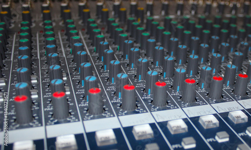 Audio mixing console close up. Professional audio mixer. Sound equipment.