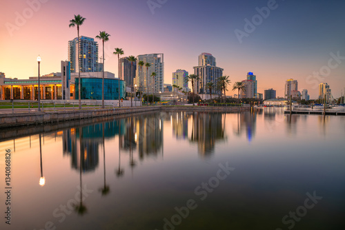 Obraz na płótnie St. Petersburg, Florida, USA. Cityscape image of St. Petersburg, Florida with reflection of the city skyline in the water at beautiful sunset. w salonie