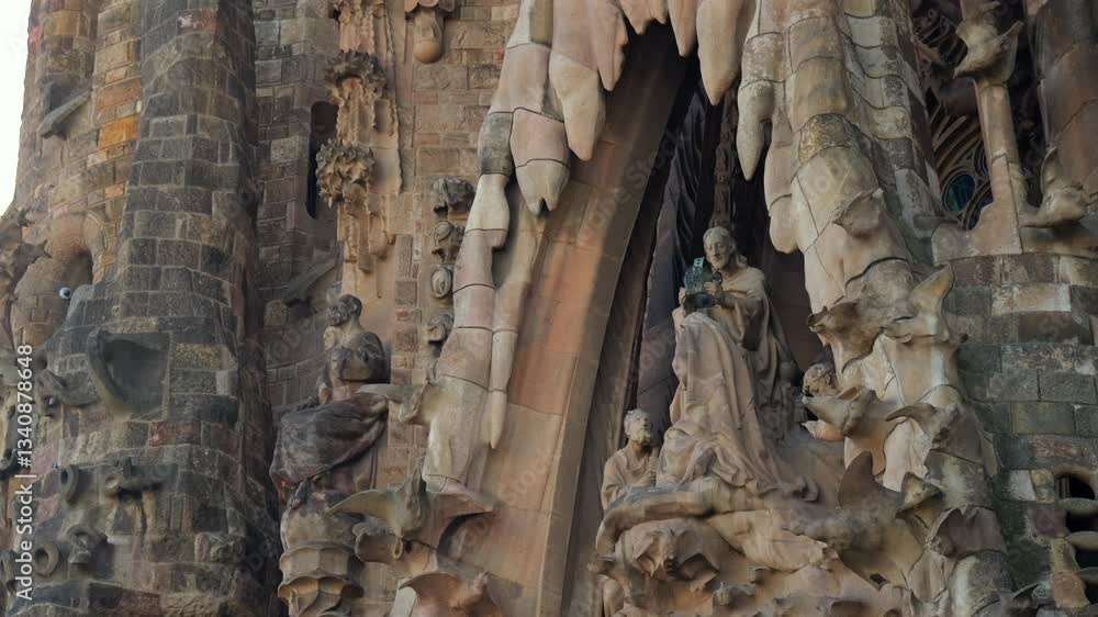 Close-up of the detailed stone sculptures on the Nativity Facade of Sagrada Familia in Barcelona, Spain. Designed by Antoni Gaudí, the facade features religious figures and organic elements. Close-up of the detailed stone sculptures on the Nativity Facade of Sagrada Familia in Barcelona, Spain. Designed by Antoni Gaudí, the facade features religious figures and organic elements.