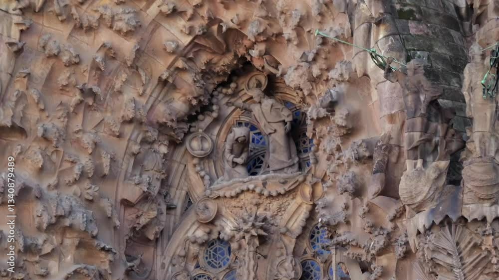 Detailed close-up of the Nativity Facade at Sagrada Familia in Barcelona, Spain. The intricate stone carvings depict biblical scenes and organic designs, reflecting Antoni Gaudí’s architectural vision Detailed close-up of the Nativity Facade at Sagrada Familia in Barcelona, Spain. The intricate stone carvings depict biblical scenes and organic designs, reflecting Antoni Gaudí’s architectural vision