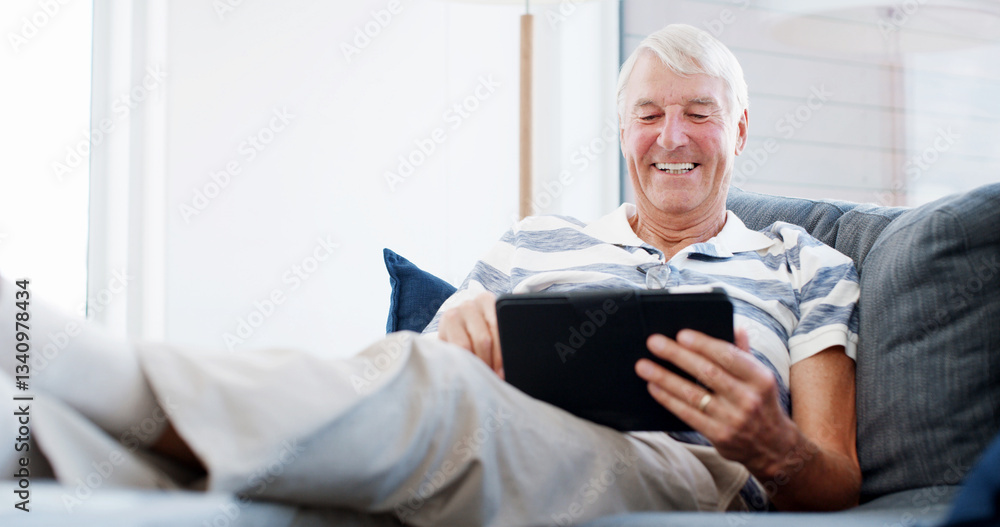 Sofa, senior man and laugh with tablet for online game, web surfing and reading ebook at home. House, elderly person and relax on couch with digital poker, social media and connection in retirement Sofa, senior man and laugh with tablet for online game, web surfing and reading ebook at home. House, elderly person and relax on couch with digital poker, social media and connection in retirement