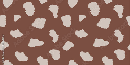 Seamless brown pastel pattern with animal print. Minimalist deer skin design background with irregular textured spots for textiles, wallpapers, wrapping paper, fabric.