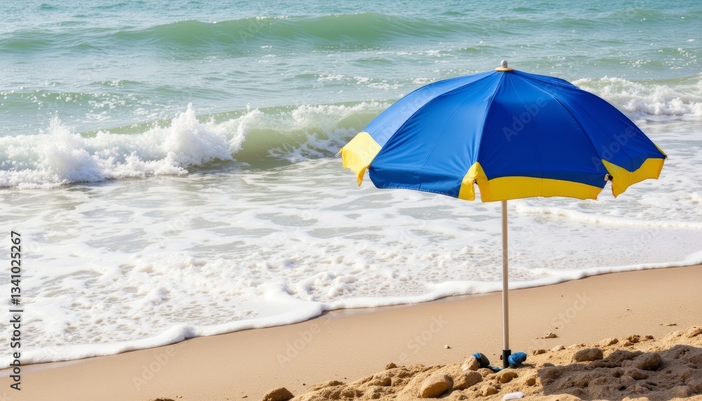 Beach umbrella by shoreline with waves, seaside relaxation Beach umbrella by shoreline with waves, seaside relaxation