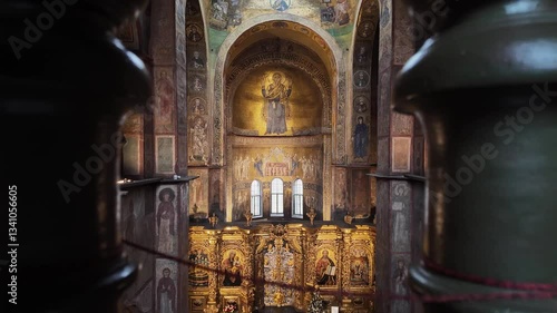 Interior of Saint Sophia Cathedral in Kyiv with golden altar and frescoes