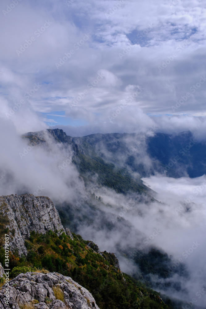 Obraz premium Clouds over Divna Gorica mountain, Suva planina, Serbia