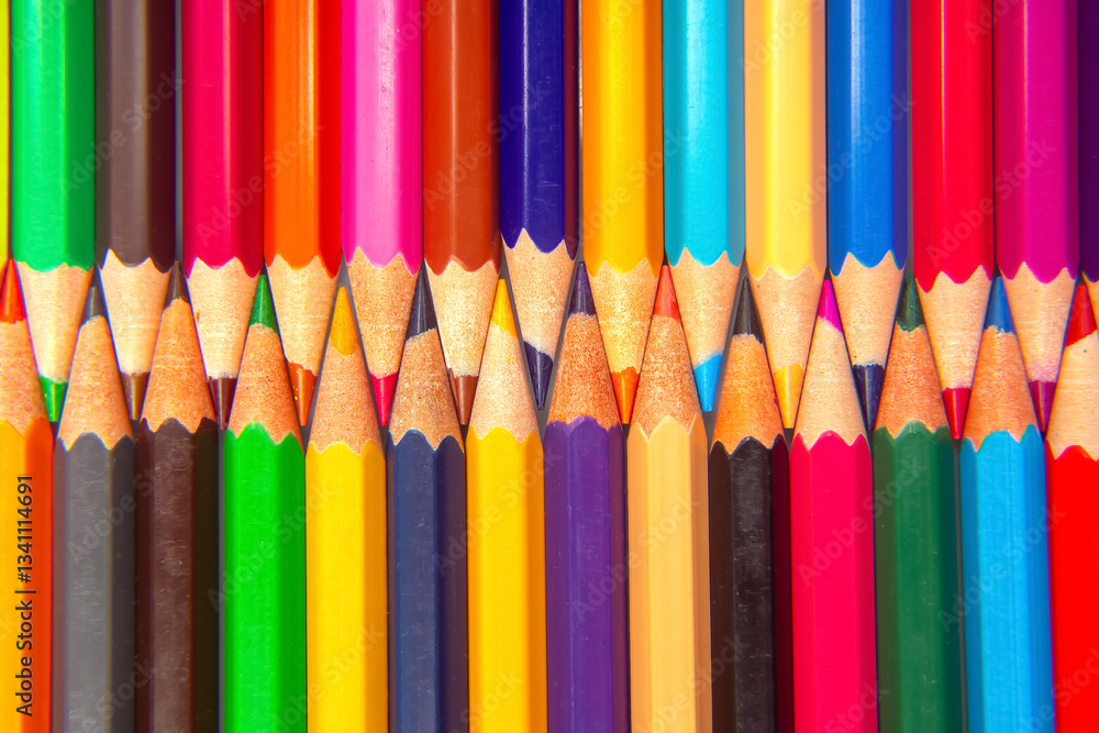 A vibrant stack of colored pencils in various hues, arranged in a grid pattern against a white background. Perfect for art supplies, creativity, and education themes. A vibrant stack of colored pencils in various hues, arranged in a grid pattern against a white background. Perfect for art supplies, creativity, and education themes.