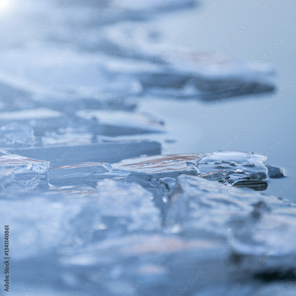 breaking the ice sheet in the lake - winter swimming - frost - cold, refreshing water