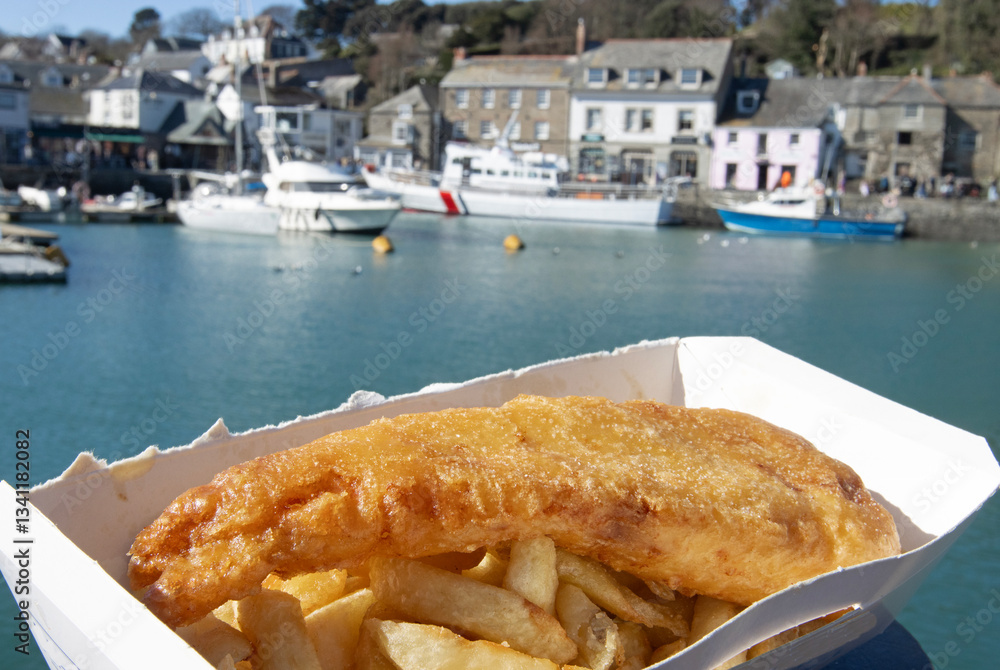 Close up of fish and chips on the harbour of the foodie port town of Padstow in Cornwall