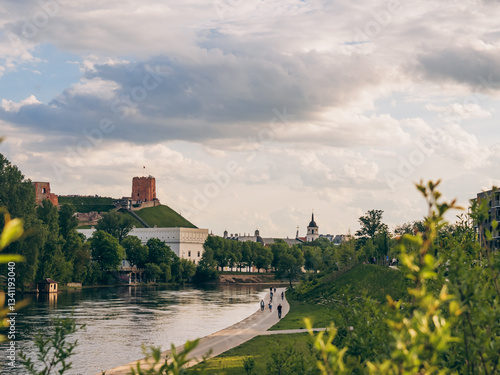 Green embankment in the center of Vilnius with a view of Gediminas' Tower