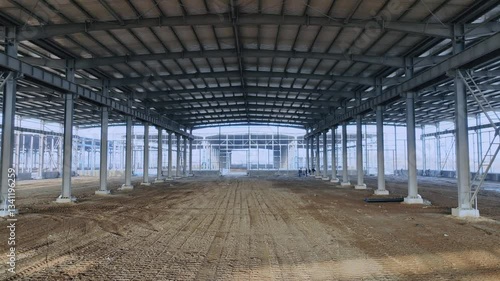 4k Video Aerial View of Large Factory Building Site Construction Plant Steel Frame Warehouse Progress