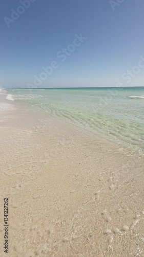 Gulf Islands National Seashore at Pensacola Beach, Florida.  Tropical summer beach vertical video.