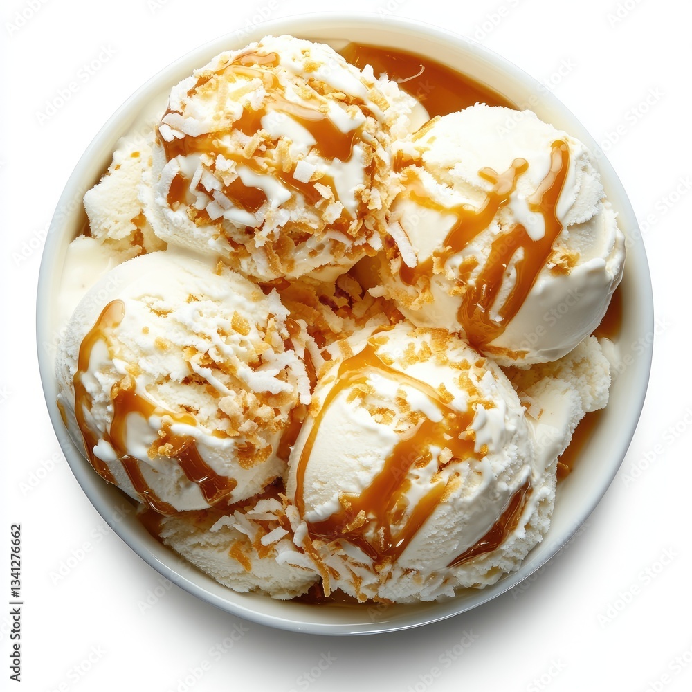 Caramel-drizzled vanilla ice cream scoops in a bowl, overhead view on white background Caramel-drizzled vanilla ice cream scoops in a bowl, overhead view on white background